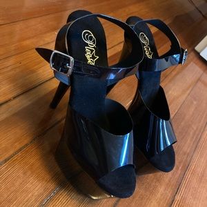 Black Patent Pleasers- 7 inch- size 12